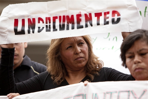 Maria Cruz Ramirez, one of several undocumented immigrants traveling across the country on the "undocubus," protests during a briefing on the civil rights effects of state immigrations law held by the U.S. Commission on Civil Rights in Birmingham, Ala., on August 17, 2012.